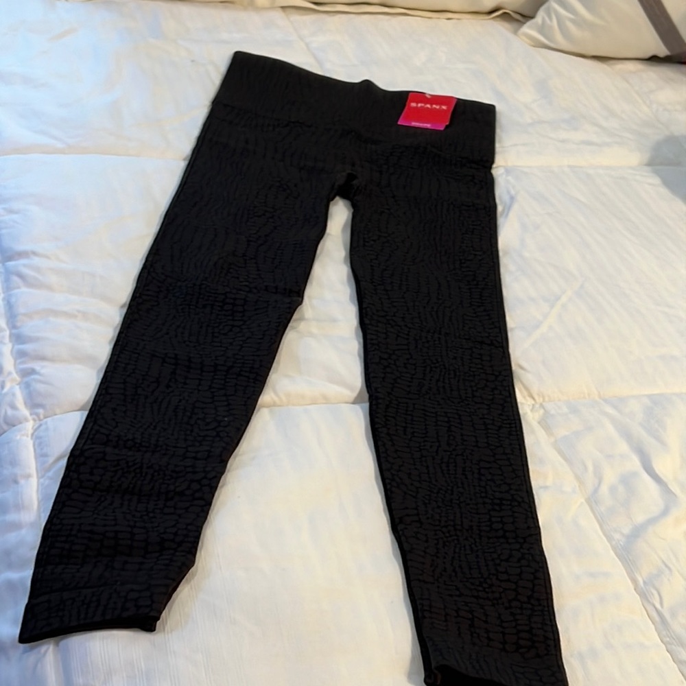 Beautiful black with brown snake skin look.